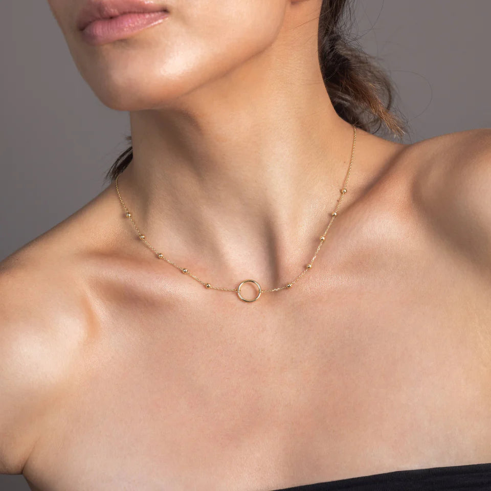 Satelital con circulo 18K