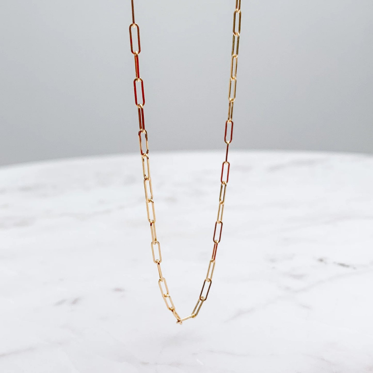 Cadena paperclip 18K