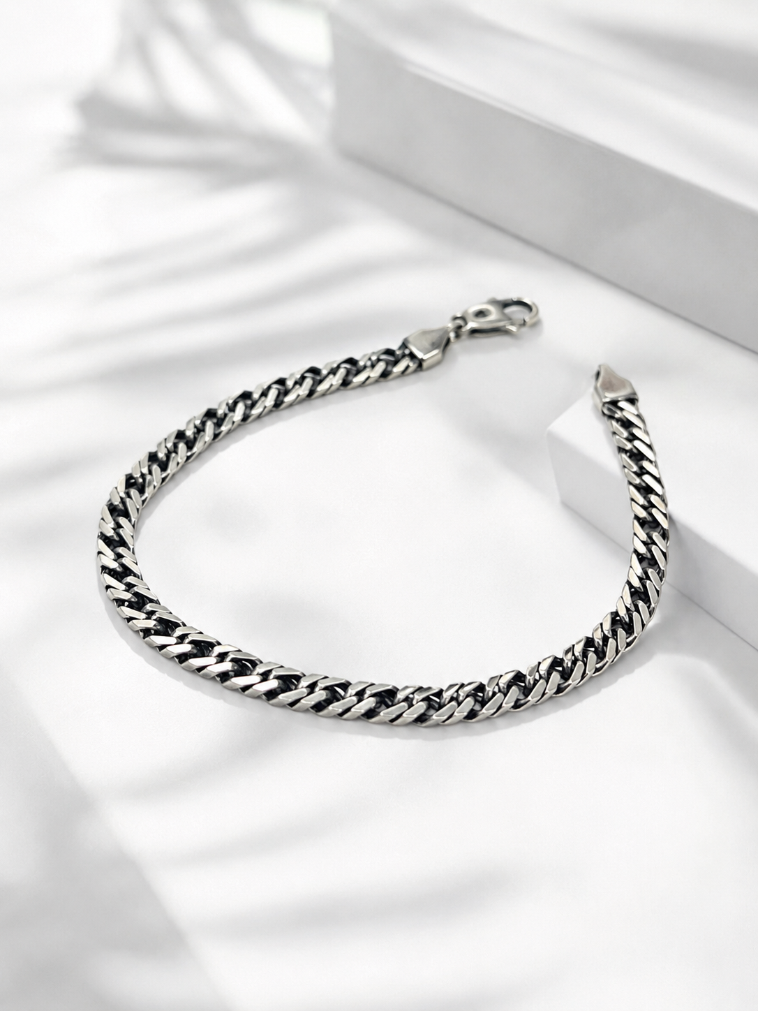Pulsera doble malla en plata quemada