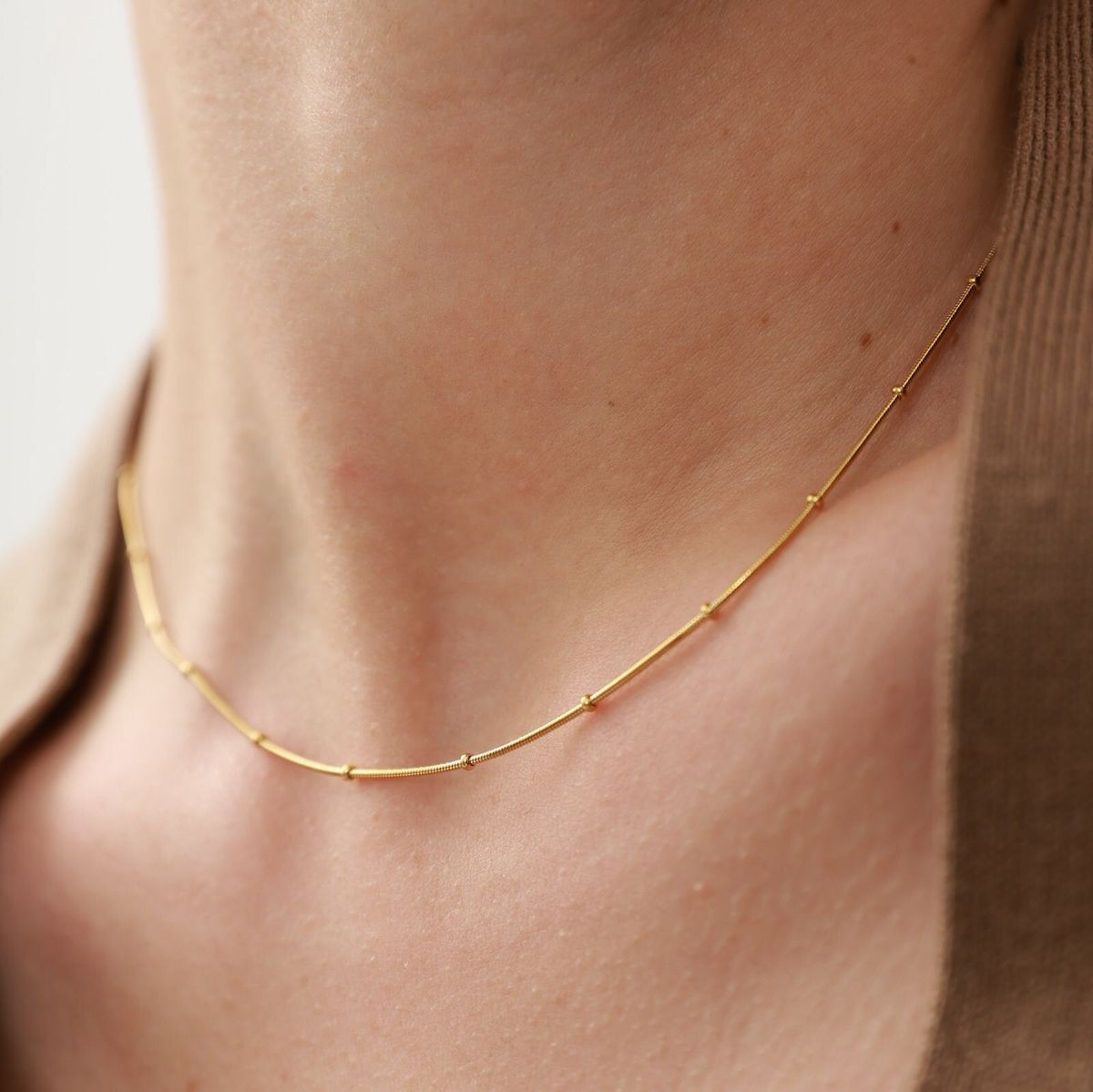 Cadena satelital (gold)