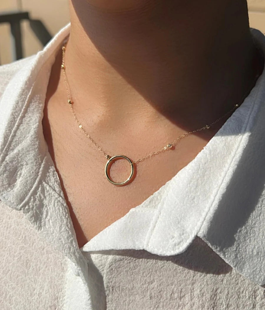 Satelital con circulo 18K